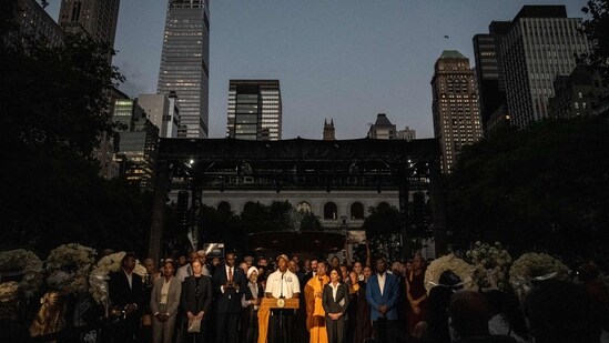 New York leaders and faith leaders gather at a vigil in Bryant Park for the people slain by the gunman in Midtown Manhattan on July 29, 2025 in New York City. Shane Devon Tamura, the gunman who shot and killed four people and then killed himself, traveled from Las Vegas and used AR-15-style weapon for the deadliest gun attack Manhattan has seen in 25 years. (AFP)