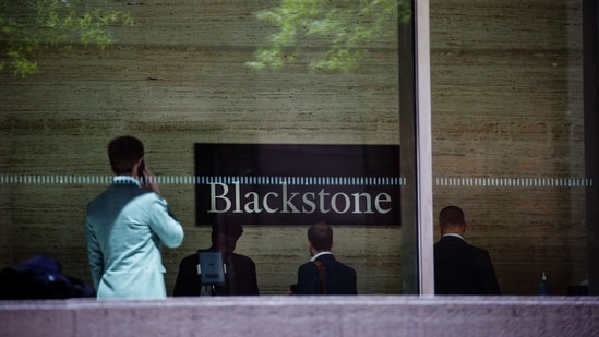 The gunman walked into the lobby openly holding the rifle, shooting first an NYPD officer working an off-duty security shift, then an unarmed security guard and a Blackstone executive,