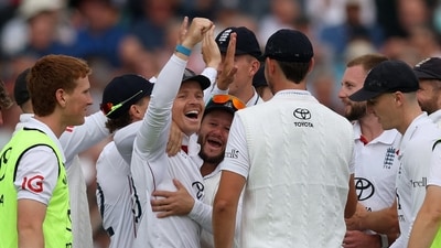 England's Ollie Pope celebrates after a successful review for India's Yashasvi Jaiswal lbw wicket off the bowling Gus Atkinson (Action Images via Reuters)
