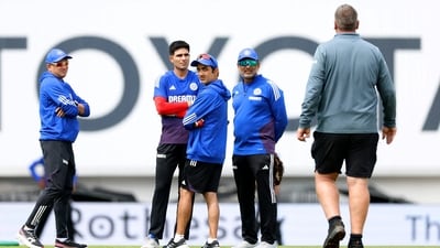 India head coach Gautam Gambhir and Shubman Gill look on as groundkeeper Lee Fortis walks towards them (Action Images via Reuters)