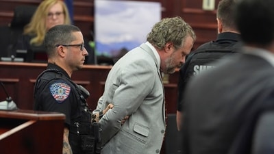 Dentist James Craig, front right, is led away as Judge Shay Whitaker, back, looks on after verdict rendered in his murder trial in district court in Araphaoe Couty Wednesday, July 30, 2025, in Centennial, Colo. (AP)