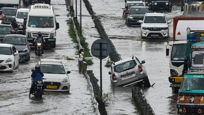 Gurugram: Commuters wade through a waterlogged Delhi-Gurugram expressway after heavy rainfall, in Gurugram, Thursday, July 31 (PTI) Gurugram: Commuters wade through a waterlogged Delhi-Gurugram expressway after heavy rainfall, in Gurugram, Thursday, July 31 (PTI)