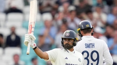 India's Karun Nair celebrates his half century during the first day of the fifth Test cricket match (PTI) India's Karun Nair celebrates his half century during the first day of the fifth Test cricket match (PTI)