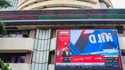 Mumbai: A woman walks past the Bombay Stock Exchange (BSE) building, in Mumbai, Monday, Aug. 5, 2024. Sensex and Nifty tumbled in early trade on Monday in-line with extremely weak trends in global markets amid fears of a slowdown in the US economy and foreign fund outflows. (PTI Photo) (PTI08_05_2024_000214B) *** Local Caption *** (PTI) Mumbai: A woman walks past the Bombay Stock Exchange (BSE) building, in Mumbai, Monday, Aug. 5, 2024. Sensex and Nifty tumbled in early trade on Monday in-line with extremely weak trends in global markets amid fears of a slowdown in the US economy and foreign fund outflows. (PTI Photo) (PTI08_05_2024_000214B) *** Local Caption *** (PTI)