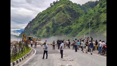 Restoration work underway on the Manali-Chandigarh highway, in Mandi, on Thursday. (PTI) Restoration work underway on the Manali-Chandigarh highway, in Mandi, on Thursday. (PTI)