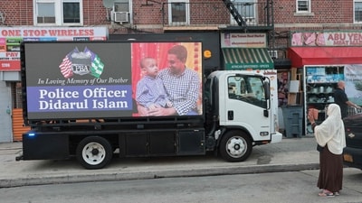 A digital billboard displayed a tribute during the funeral of slain NYPD officer Didarul Islam at Parkchester Jame Masjid on July 31, 2025, in the Bronx. (Photo by Michael M. Santiago / GETTY IMAGES NORTH AMERICA / Getty Images via AFP) (Getty Images via AFP) A digital billboard displayed a tribute during the funeral of slain NYPD officer Didarul Islam at Parkchester Jame Masjid on July 31, 2025, in the Bronx. (Photo by Michael M. Santiago / GETTY IMAGES NORTH AMERICA / Getty Images via AFP) (Getty Images via AFP)