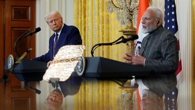 U.S. President Donald Trump and Indian Prime Minister Narendra Modi are pictured in a mirror as they attend a joint press conference at the White House in Washington, D.C., U.S., February 13, 2025. (REUTERS)
