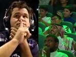 Magnus Carlsen made a special gesture to silence the crowd. Magnus Carlsen made a special gesture to silence the crowd.