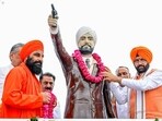Haryana chief minister Nayab Singh Saini garlanding the statue of Shaheed Udham Singh during an event in Sirsa. (Sourced)
