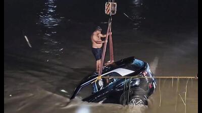 A car being lifted from the Yamuna canal after an accident in Karnal on Thursday. (PTI)