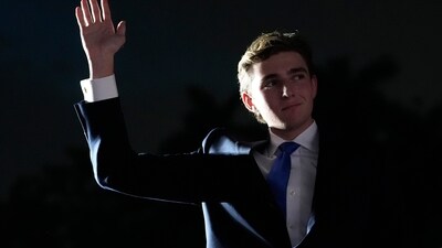 Barron Trump waves as his father President Donald Trump, speaks at a campaign rally at Trump National Doral Miami on July 9, 2024. (AP/Rebecca Blackwell) Barron Trump waves as his father President Donald Trump, speaks at a campaign rally at Trump National Doral Miami on July 9, 2024. (AP/Rebecca Blackwell)