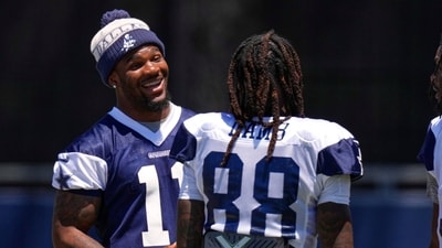 Dallas Cowboys defensive end Micah Parsons, left, talks with wide receiver CeeDee Lamb during training camp Thursday (AP) Dallas Cowboys defensive end Micah Parsons, left, talks with wide receiver CeeDee Lamb during training camp Thursday (AP)