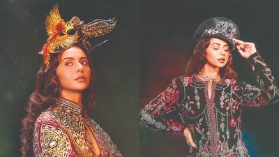 Outfit 1: JJ Valaya | Jewellery: Shree Jee Jewellers | She stuns in a maroon JJ Valaya gown with gold and silver embroidery, sequins, and delicate gota work. Jewelled details with kundans and kasab add to the richness. The look is finished with a bold gold bird headpiece by Deepa Gurnani and a green choker from Shree Jee Jewellers.
Outfit 2: Falguni Shane Peacock | Jewellery: Shree Jee Jewellers | Rakul stuns in a black velvet robe with rich floral and jewel-toned embroidery by Falguni Shane Peacock, worn over a sheer embellished dress. The dramatic look is finished with a sequinned hat by Deepa Gurnani and layered necklaces from Shree Jee Jewellers. (Photo: Tejas Nerurkar) Outfit 1: JJ Valaya | Jewellery: Shree Jee Jewellers | She stuns in a maroon JJ Valaya gown with gold and silver embroidery, sequins, and delicate gota work. Jewelled details with kundans and kasab add to the richness. The look is finished with a bold gold bird headpiece by Deepa Gurnani and a green choker from Shree Jee Jewellers.
Outfit 2: Falguni Shane Peacock | Jewellery: Shree Jee Jewellers | Rakul stuns in a black velvet robe with rich floral and jewel-toned embroidery by Falguni Shane Peacock, worn over a sheer embellished dress. The dramatic look is finished with a sequinned hat by Deepa Gurnani and layered necklaces from Shree Jee Jewellers. (Photo: Tejas Nerurkar)
