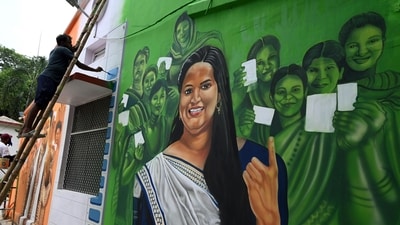 A painter paints a wall to create awareness among voters ahead of the Bihar Assembly elections 2025 at the state election department premises, in Patna, on Friday. (ANI) A painter paints a wall to create awareness among voters ahead of the Bihar Assembly elections 2025 at the state election department premises, in Patna, on Friday. (ANI)