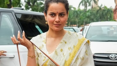 A recent session was graced by the fashion icon in a white and gold linen ensemble, paired with gold jewelry and matching white nails. (Ravi Choudhary/PTI)