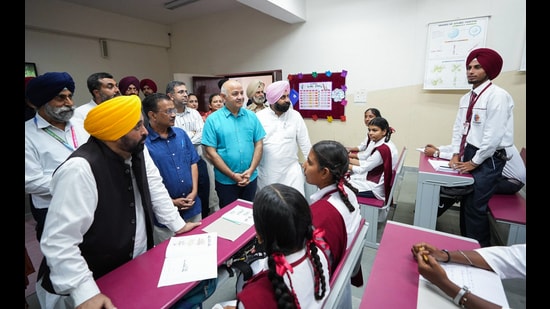 Punjab CM Bhagwant Mann, AAP national convener Arvind Kejriwal, party leader Manish Sisodia interact with school students at a government in Fazilka on Friday. (Photo: X)