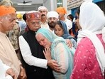 Himachal Pradesh governor Shiv Pratap Shukla interact with flood victims in Mandi on Saturday. (Birbal Sharma/HT) Himachal Pradesh governor Shiv Pratap Shukla interact with flood victims in Mandi on Saturday. (Birbal Sharma/HT)