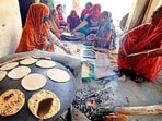 Mid-day meal workers prepare lunch in a school in Ludhiana. (HT) Mid-day meal workers prepare lunch in a school in Ludhiana. (HT)