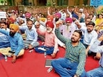 PSPCL junior engineers protesting outside the chief engineer’s office in Ludhiana on Friday. (Gurpreet Singh/HT) PSPCL junior engineers protesting outside the chief engineer’s office in Ludhiana on Friday. (Gurpreet Singh/HT)