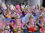 Pune, India - August 31, 2024: An artist doing last touch ups to the Ganesha idol for the upcoming Ganesh Festival at Shukrawar peth in Pune, India, on Saturday, August 31, 2024. (HT photo)