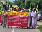 Villagers protesting against the Punjab government’s land pooling scheme at Sangrur’s Sohiana village on Friday. (HT) Villagers protesting against the Punjab government’s land pooling scheme at Sangrur’s Sohiana village on Friday. (HT)