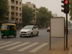 Visuals of such posters being put up on the streets went viral on Saturday, with claims that they were sponsored by the Ahmedabad traffic police. Visuals of such posters being put up on the streets went viral on Saturday, with claims that they were sponsored by the Ahmedabad traffic police.