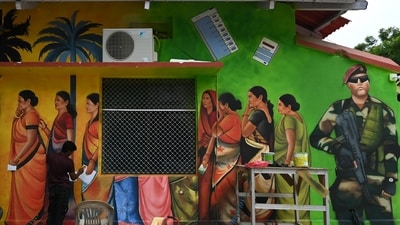 A painter paints a wall to create awareness among voters ahead of the Bihar Assembly elections 2025 at the state election department premises, in Patna on Friday. (ANI)