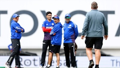 India head coach Gautam Gambhir and Shubman Gill look on as groundkeeper Lee Fortis walks towards them during practice (Action Images via Reuters)