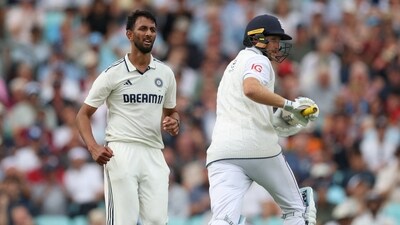 England's Joe Root in action as India's Prasidh Krishna reacts after bowling (Action Images via Reuters)