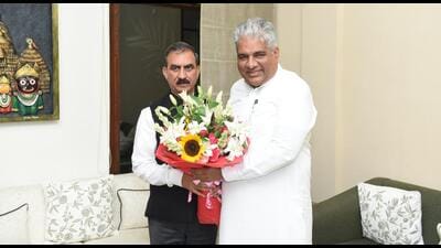Chief minister Sukhvinder Singh Sukhu calling on Union minister of environment, forests and climate change Bhupender Yadav in New Delhi on Friday evening. (HT Photo)