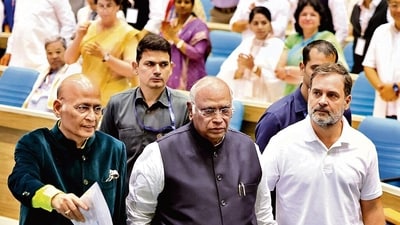 Congress President Mallikarjun Kharge with Leader of Opposition in the Lok Sabha Rahul Gandhi and party leader Abhishek Singhvi during the party's Annual Legal Conclave at Vigyan Bhawan in New Delhi. (HT PHOTO) Congress President Mallikarjun Kharge with Leader of Opposition in the Lok Sabha Rahul Gandhi and party leader Abhishek Singhvi during the party's Annual Legal Conclave at Vigyan Bhawan in New Delhi. (HT PHOTO)