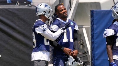 Dallas Cowboys cornerback C.J. Goodwin, left, talks with defensive end Micah Parsons during training camp (AP) Dallas Cowboys cornerback C.J. Goodwin, left, talks with defensive end Micah Parsons during training camp (AP)