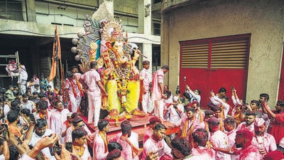 Mumbai, India - August 02, 2025: Charkop’s beloved Raja is finally heading for immersion after 177 days. Following a long legal battle, this victory belongs to the mandals, committees, and thousands of devotees. The streets came alive with drumbeats, clouds of gulal, and grand celebrations. Devotees gathered in huge numbers to witness this historic immersion procession in Mumbai, India, on Saturday, August 02, 2025. (Photo by Satish Bate/ Hindustan Times) (Hindustan Times) Mumbai, India - August 02, 2025: Charkop’s beloved Raja is finally heading for immersion after 177 days. Following a long legal battle, this victory belongs to the mandals, committees, and thousands of devotees. The streets came alive with drumbeats, clouds of gulal, and grand celebrations. Devotees gathered in huge numbers to witness this historic immersion procession in Mumbai, India, on Saturday, August 02, 2025. (Photo by Satish Bate/ Hindustan Times) (Hindustan Times)