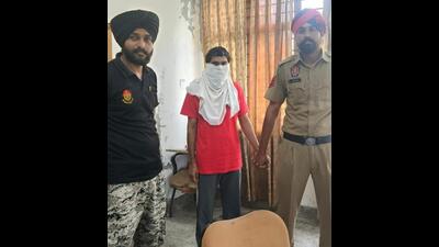 Parveen Lonkar in police custody in Fazilka on Saturday. (HT Photo) Parveen Lonkar in police custody in Fazilka on Saturday. (HT Photo)