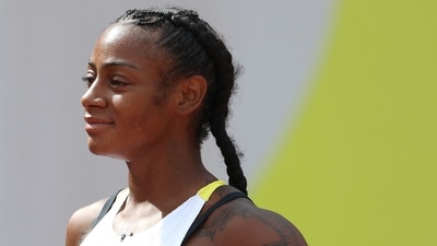 Olympic sprinter Sha’Carri Richardson arrested after altercation with boyfriend Christian Coleman at Seattle airport, escalating from a heated argument to physical confrontation. (Photo by Emilee Chinn / GETTY IMAGES NORTH AMERICA / Getty Images via AFP) (Getty Images via AFP) Olympic sprinter Sha’Carri Richardson arrested after altercation with boyfriend Christian Coleman at Seattle airport, escalating from a heated argument to physical confrontation. (Photo by Emilee Chinn / GETTY IMAGES NORTH AMERICA / Getty Images via AFP) (Getty Images via AFP)