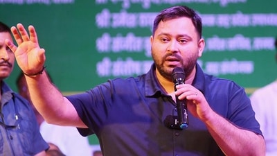 Leader of Opposition and RJD leader Tejashwi Yadav addressing during Nai Parivar Adhikar Mahasammelan at S.K. Memorial hall in Patna, Bihar. (HT Photo)