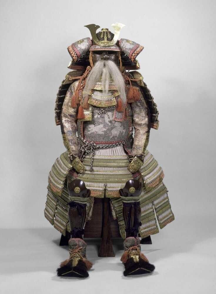 A suit of armour created for Date Yoshimura, a feudal landlord in north-eastern Japan, likely in the 16th century. It is made of lacquered iron with metal details that include iron chain mail, patterned silk sleeves and fittings of gilded metal and silver. (V&A East Storehouse)