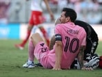 Trainers had to come and help an injured Lionel Messi, who was eventually subbed off in the 11th minute. 