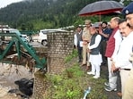 Himachal Pradesh governor Shiv Pratap Shukla along with leader of the Opposition Jai Ram Thakur visits the cloudburst-hit area at Seraj in Mandi on Sunday. (Birbal Sharma/ HT) Himachal Pradesh governor Shiv Pratap Shukla along with leader of the Opposition Jai Ram Thakur visits the cloudburst-hit area at Seraj in Mandi on Sunday. (Birbal Sharma/ HT)