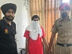 Parveen Lonkar in police custody in Fazilka on Saturday. (HT Photo) Parveen Lonkar in police custody in Fazilka on Saturday. (HT Photo)