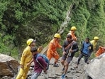 Pilgrims en route to Badrinath are being asked to cross the bridge on foot. (PTI)