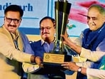 Union health minister JP Nadda presenting the Best ROTTO Award to PGIMER director Dr Vivek Lal and other officials from the institute. (HT Photo)