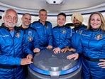 Arvinder 'Arvi' Singh Bahal (centre) with some of the others set for Blue Origin's space tourism flight NS-34.