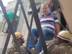 A quick-response fire and disaster team saved two residents and a dog after part of a Vasundhara apartment roof collapsed.