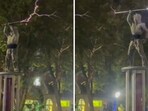 In the now-viral clip, the two performers don custom-designed suits that shield their bodies from high-voltage electricity. In the now-viral clip, the two performers don custom-designed suits that shield their bodies from high-voltage electricity.