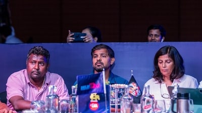 Team owners react during the DPL 2025 women's auction. 