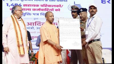 Chief minister Yogi Adityanath distributed appointment letters to 1,374 assistant operators and 120 workshop staff selected for the UP Police telecommunications department. (HT Photo) Chief minister Yogi Adityanath distributed appointment letters to 1,374 assistant operators and 120 workshop staff selected for the UP Police telecommunications department. (HT Photo)