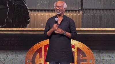 Rajinikanth at his upcoming film Coolie's audio launch. Rajinikanth at his upcoming film Coolie's audio launch.