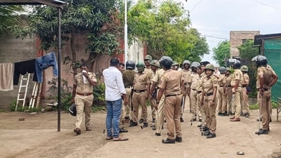 Pune: Security personnel keep vigil after two groups clashed over an alleged objectionable post on Friday, at Yavat in Pune's Daund tehsil. (PTI)