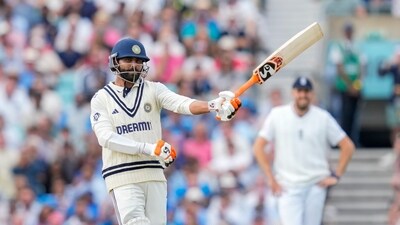 London: India's batter Ravindra Jadeja celebrates his half century during the third day of the fifth Test match between India and England (PTI) London: India's batter Ravindra Jadeja celebrates his half century during the third day of the fifth Test match between India and England (PTI)